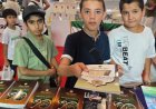 وفد طلابي من مدارس إسطنبول يزورون جناح "رسالة السلام" بمعرض الكتاب | صور